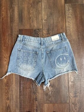 Women's Light Blue Denim Cutoff Shorts with Smile Detail